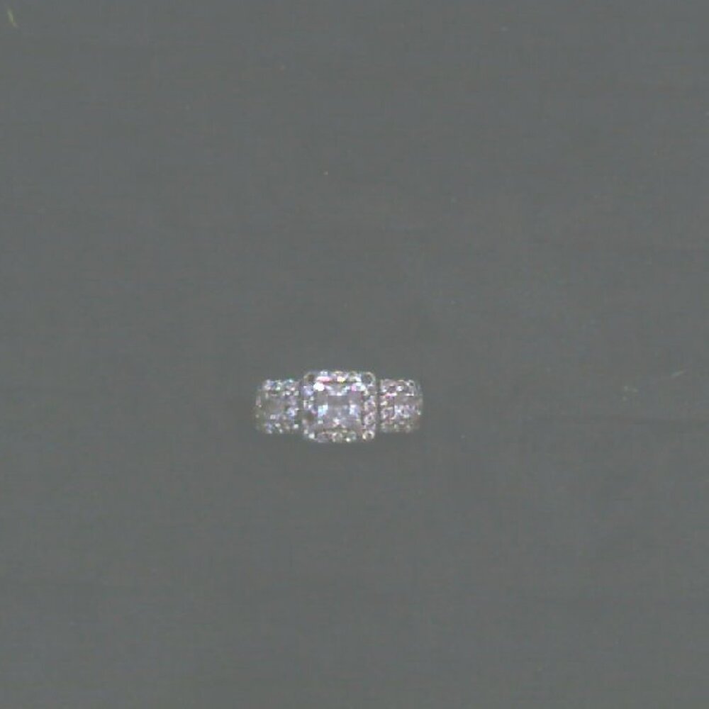 Stunning White Gold, Diamond, and Zirconia Engagement Ring